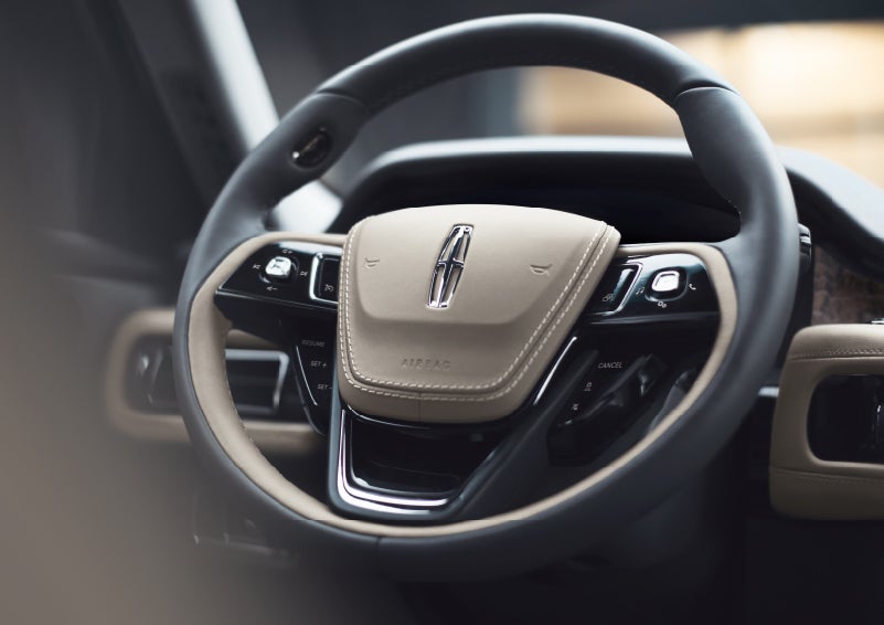 The intuitively placed controls of the steering wheel on a 2024 Lincoln Aviator® SUV | Oliver Lincoln in Plymouth IN