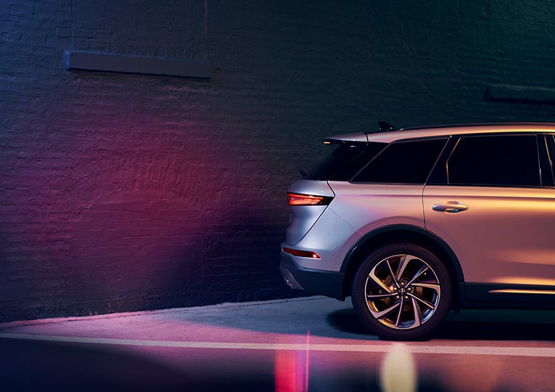 A 2024 Lincoln Corsair® SUV is shown backing up toward a wall. | Oliver Lincoln in Plymouth IN