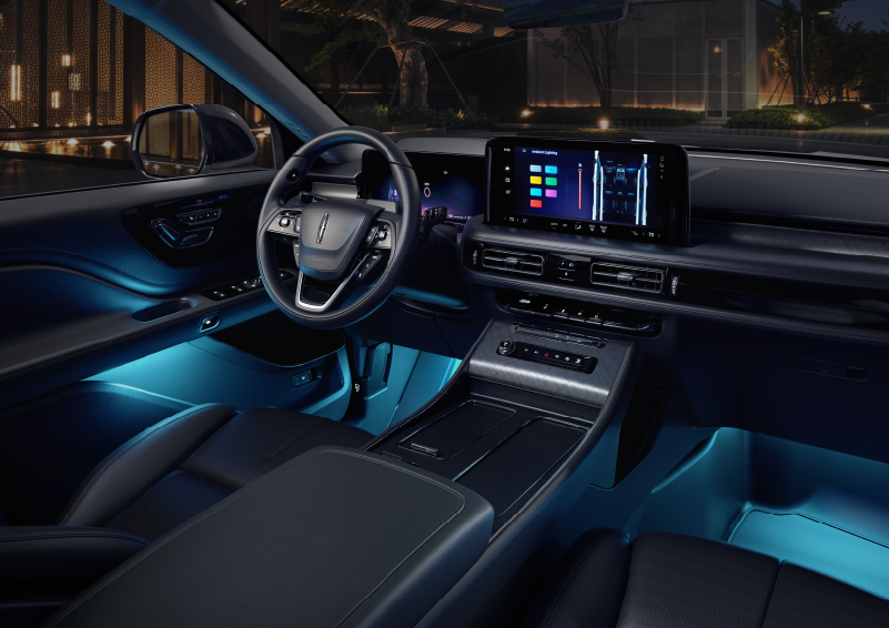 Deep blue ambient lighting glows from various places within a 2025 Lincoln Aviator® SUV. | Oliver Lincoln in Plymouth IN