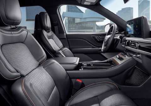 The interior of the 2025 Lincoln Aviator® SUV is shown with sleek black accents. | Oliver Lincoln in Plymouth IN