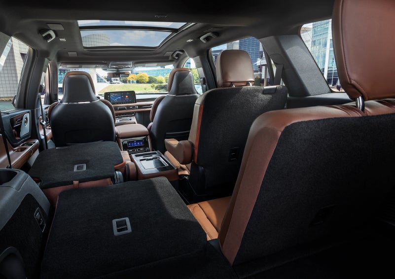 The interior of the 2025 Lincoln Aviator® SUV is shown with two seats folded down for added space. | Oliver Lincoln in Plymouth IN