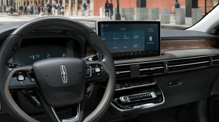 The center screen of the new 2025 Lincoln Corsair® SUV is showcased with its SYNC® 4 capabilities highlighted | Oliver Lincoln in Plymouth IN