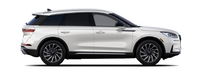 The passenger side of a Lincoln Corsair® SUV is shown in the Ceramic Pearl extra-cost exterior paint option. | Oliver Lincoln in Plymouth IN