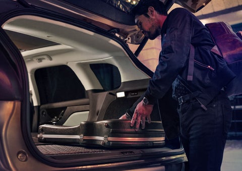 The driver of a 2024 Lincoln Corsair® SUV is shown selecting the drive mode. | Oliver Lincoln in Plymouth IN