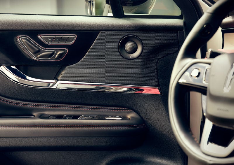 An audio speaker is shown in the driver's side door of a 2024 Lincoln Corsair® SUV. | Oliver Lincoln in Plymouth IN