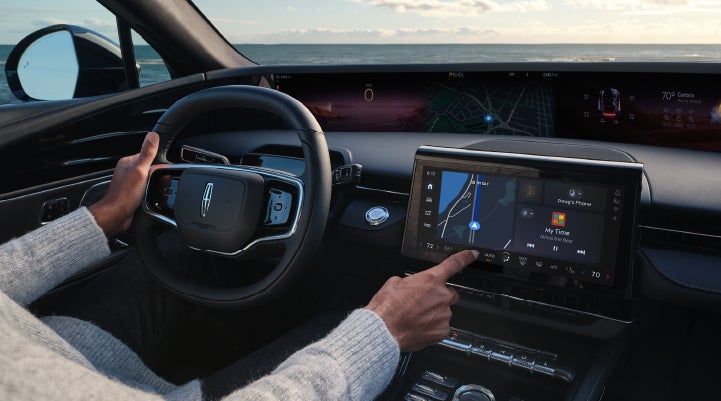 The driver of a 2025 Lincoln Nautilus® SUV interacts with the new Lincoln Digital Experience. | Oliver Lincoln in Plymouth IN