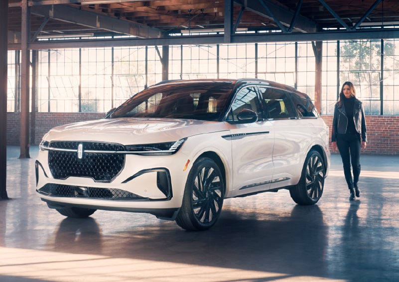 A person approaches a 2025 Lincoln Nautilus® SUV. | Oliver Lincoln in Plymouth IN