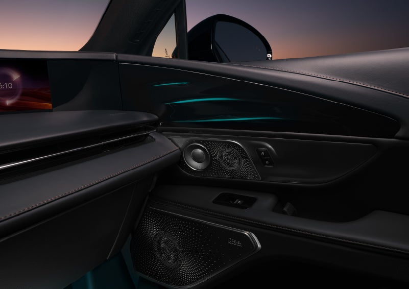 Selectable ambient lighting glows in the passenger door panel. | Oliver Lincoln in Plymouth IN