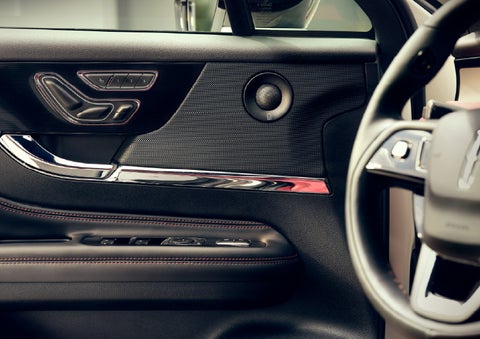An audio speaker is shown in the driver's side door of a 2026 Lincoln Corsair® SUV | Oliver Lincoln in Plymouth IN