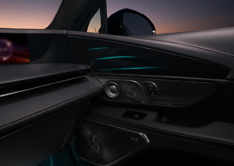 Selectable ambient lighting glows in the passenger door panel. | Oliver Lincoln in Plymouth IN