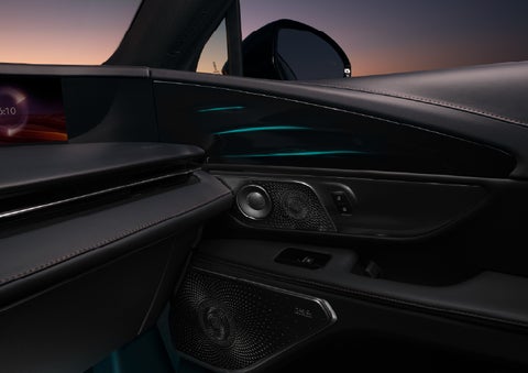 Selectable ambient lighting glows in the passenger door panel. | Oliver Lincoln in Plymouth IN